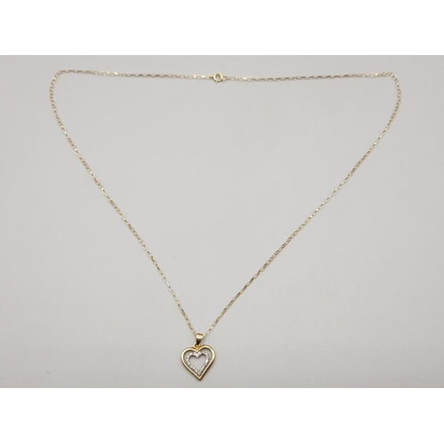 201 - Ladies 9ct yellow gold heart pendant & chain, featuring a double heart with the inside set with 18 r... 