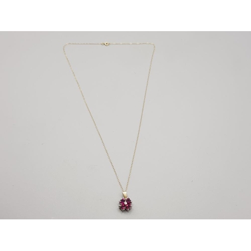 206 - Ladies 9ct yellow gold pendant & chain featuring 4 purple shaped hearts set in a cluster with a sing... 