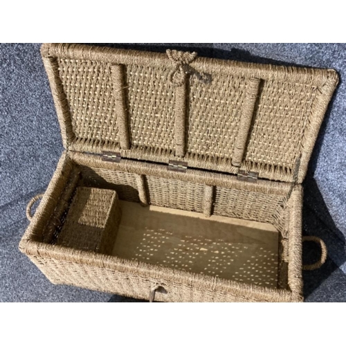 221 - A woven fibre blanket box and a small suitcase