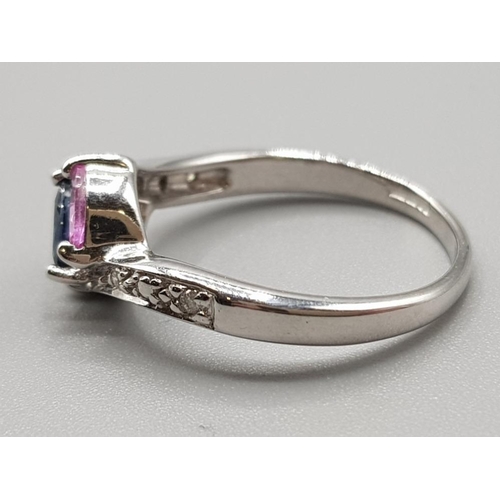 232 - Ladies 9ct white gold dress ring featuring a peridot, sapphire & pink stone marque shaped stone set ... 