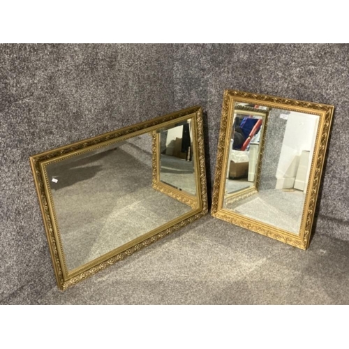 407 - Two bevelled gilt wall mirrors