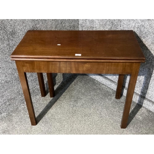 409 - An Edwardian inlaid mahogany turnover top tea table