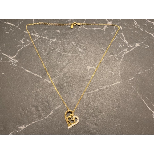 108 - Silver gilt heart shape pendant & chain, heart inscribed “home is where my mum is” with CZ stones, 4... 