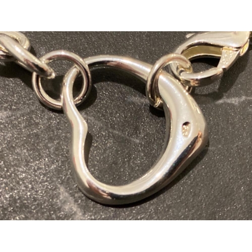 114 - Heavy silver 925 bracelet with heart shaped attachment, 20.5g