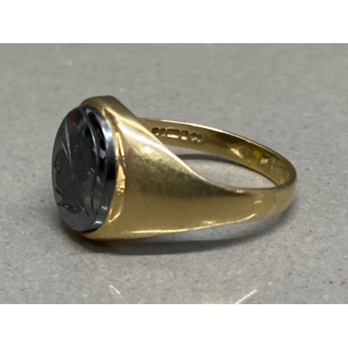 132 - 9ct yellow gold signet ring with dark stone, size P, 3.2g