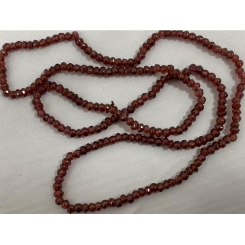 338 - Limited edition African 100.00ct red garnet beaded necklace, with certificate of authenticity