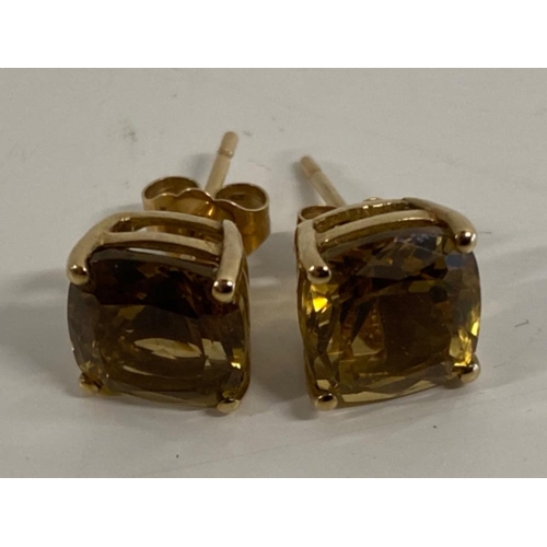 340 - Pair of 9ct yellow gold square shaped earrings with champagne quartz stones, 2.2g gross