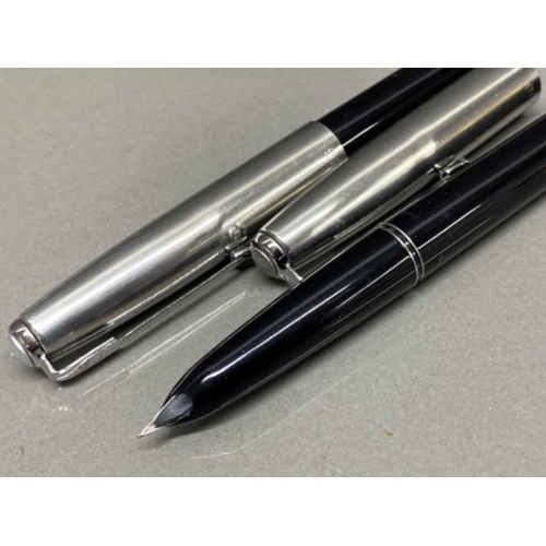 37 - Two classic fountain pens (Parker style), fine nip, black colour, both Retro style