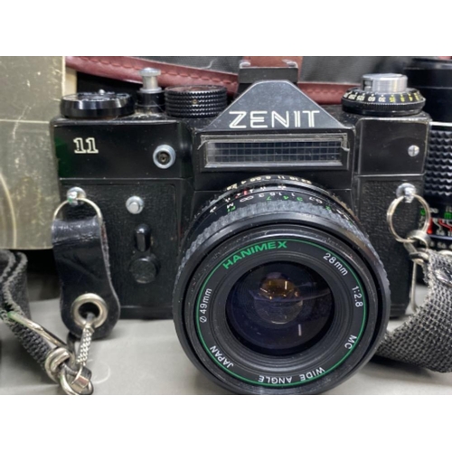 45 - Zenit Helios 11 camera - with extra lenses & carry bag etc