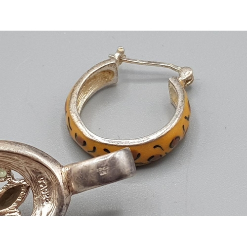 57 - Silver and enamel hoop earrings and a silver enamel and paste stone pendant