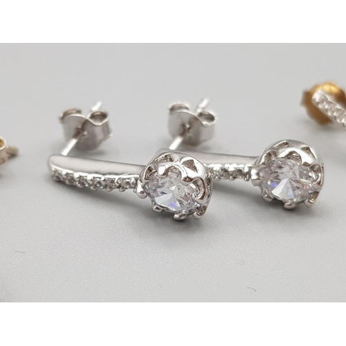 59 - Two pairs of silver and CZ earrings