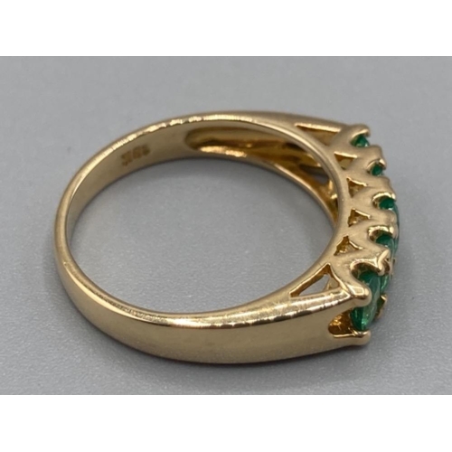 139 - Ladies 18ct yellow gold and emerald five stone ring size L 3.8g gross