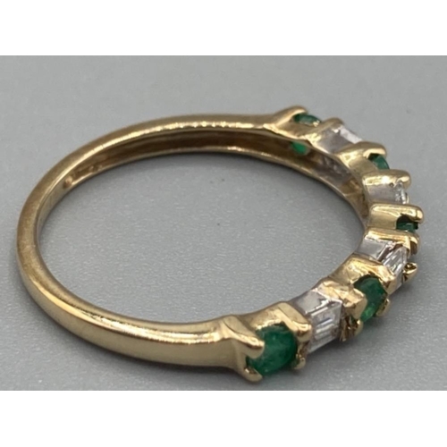 148 - Ladies 9ct yellow gold emerald and diamond band size L 1/2 1.4g gross