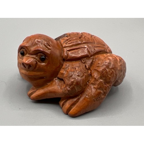 201 - Netsuke carved wooden figures