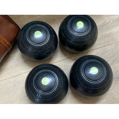 300 - Set of 4 Tyrolite lawn bowls with Slazenger bag