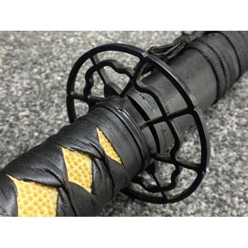 328 - Ornamental Japanese Katana (Samurai sword) in black with metal spindled Tsuba, comes complete with S... 