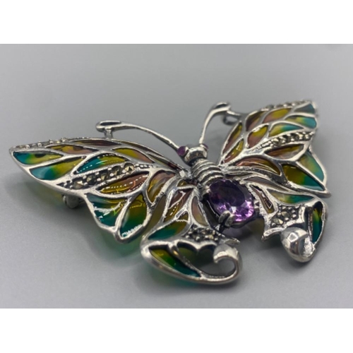 67 - A silver and plique a jour butterfly brooch with amethyst cabochon,12.2g