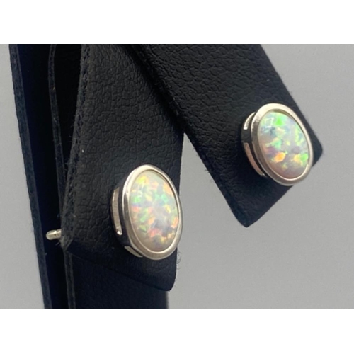 70 - A pair of silver and opal stud earrings, 1.1g