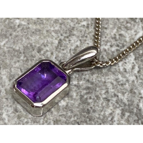 60 - 9ct white gold & purple stone pendant on chain with matching earrings, 4.1g gross