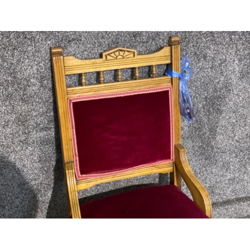 636 - Oak framed nursing chair with red velvet back & seat (back right castor needs reattached)