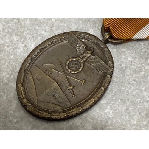 182 - WWII German Nazi westwall medal with original ribbon, instituted by Hitler on August 2nd 1939 and aw... 