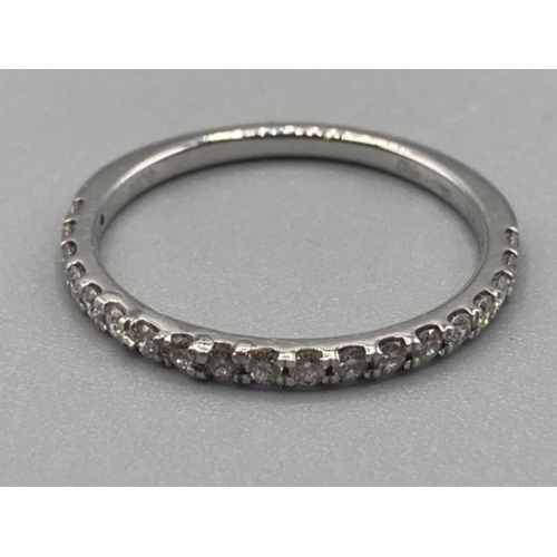 111 - Ladies 9ct white gold diamond band approx .27ct size L 1.3g gross