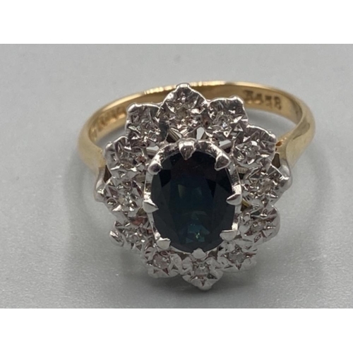 124 - Ladies 18ct yellow gold sapphire and diamond cluster ring size M 5g gross