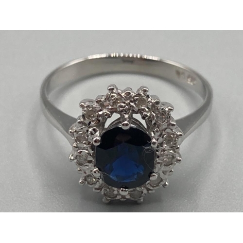 126 - Ladies 14ct white gold sapphire and diamond cluster ring size P 3.1g gross