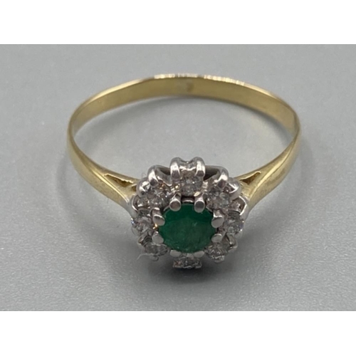 143 - Ladies 18ct yellow gold emerald and diamond cluster ring size M 2g gross