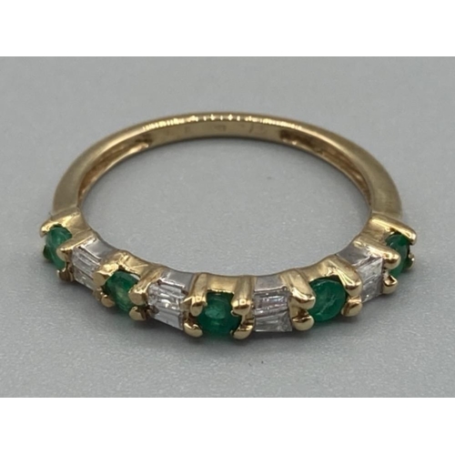 148 - Ladies 9ct yellow gold emerald and diamond band size L 1/2 1.4g gross