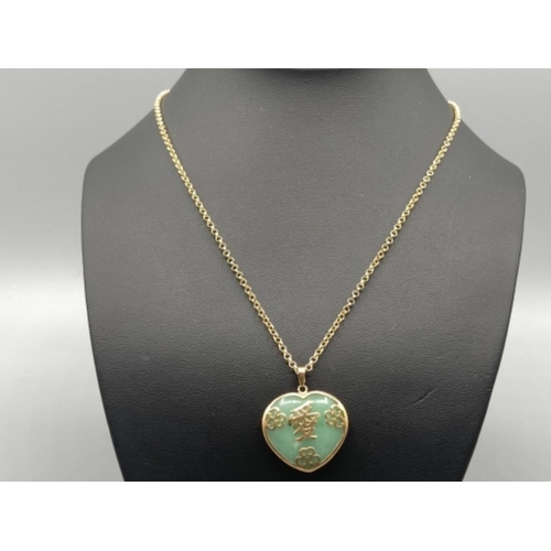 149 - 9ct yellow gold and jade heart pendant and chain (30cm long) 12.4g gross