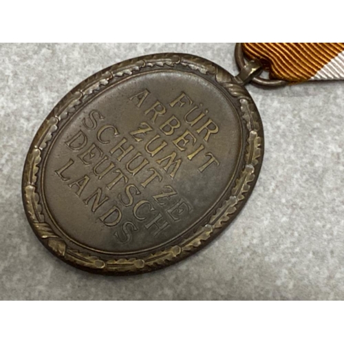 182 - WWII German Nazi westwall medal with original ribbon, instituted by Hitler on August 2nd 1939 and aw... 