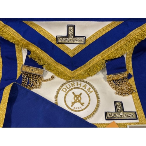 208 - Masonic items including aprons, ribbons and books