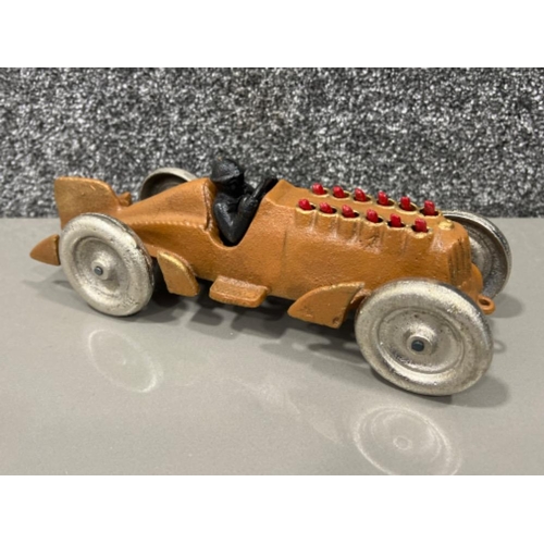 258 - Cast metal Racing car with moving pistons