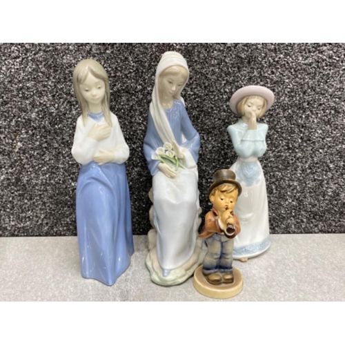 275 - Lladro figure 4972 sitting girl with lilies together with 2x Nao figures & Goebel Hummel figure