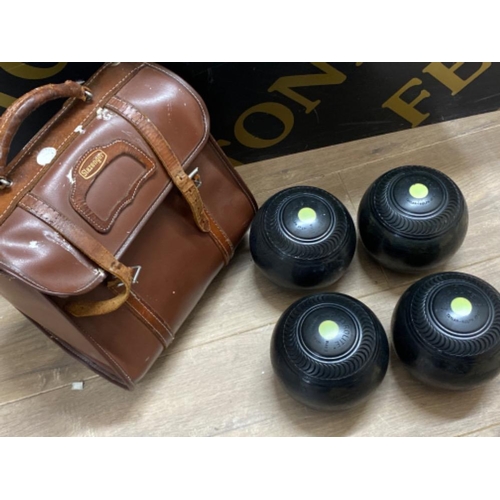 300 - Set of 4 Tyrolite lawn bowls with Slazenger bag