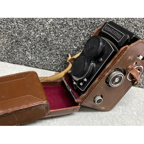 34 - Rolleicord Vb TLR film camera with brown leather case