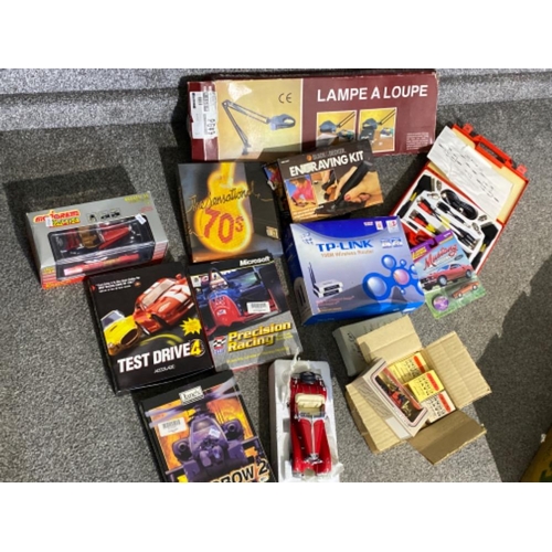 369 - Box containing miscellaneous items including diecast cars, PC games, desk lamp etc