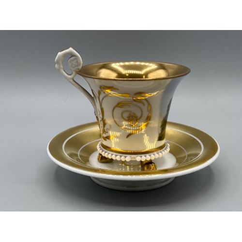 4 - Meissen gold patterned cup and saucer.