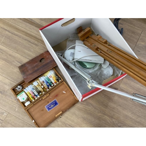 422 - Box containing wooden easel & artists paint box with paints, also includes a contemporary desk lamp