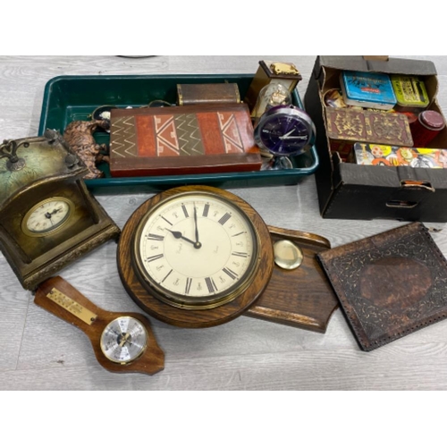 424 - Green tray of studio pottery & various clocks, bison figurine, boxes etc together with box tins, lea... 