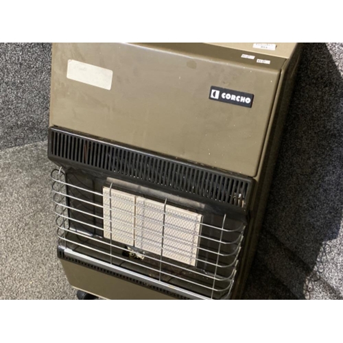 453 - Vintage metal Corcho gas heater with gas cylinder in good working condition