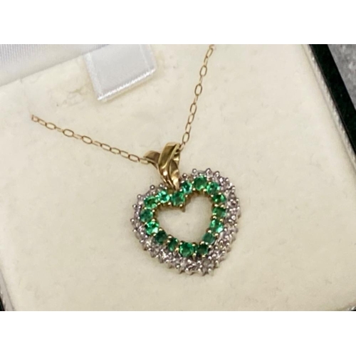 468 - 9ct gold emerald & diamond heart shaped pendant & 9ct chain, 43cm length chain, 4g