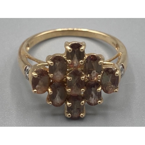 480 - 9ct gold and pale brown stone ring size P 3.2g gross