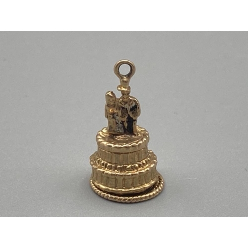 486 - 9ct gold wedding cake charm 2.9g