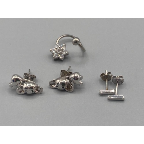 494 - Brand new ex display sterling silver and white stone belly ring and two pairs of silver earrings