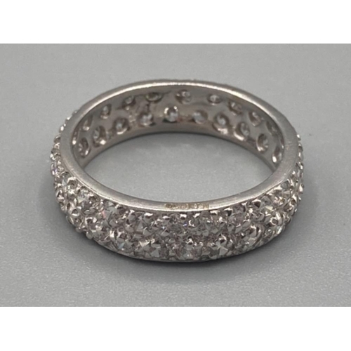 506 - Brand new ex display 9ct white gold and white stone eternity ring size J 1/2 2.5g gross