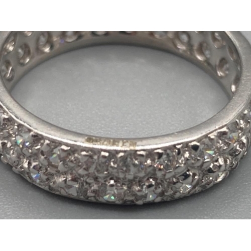 506 - Brand new ex display 9ct white gold and white stone eternity ring size J 1/2 2.5g gross