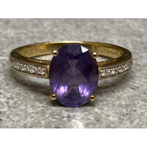 550 - 9ct yellow gold purple amethyst & 8x diamond ring - size L, 2g gross