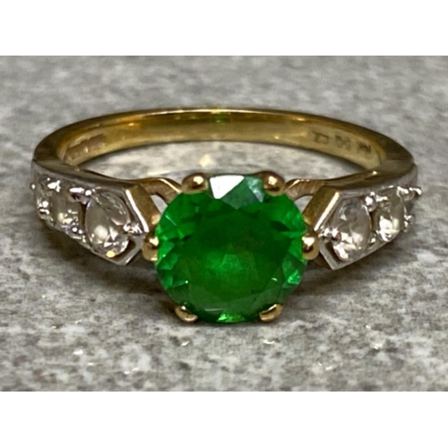 559 - 9ct yellow gold & green stone ring with shoulder CZ stones, Size L1/2, 2.8g